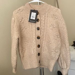 NWT cream colored knitted sweater